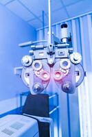 Ophtalmology patient taking health care. Professional eye diagnostic equipment. photo