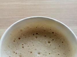 Coffee in a paper cup. Hot coffee photo