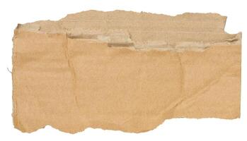 Piece of brown cardboard with torn edges on isolated background photo