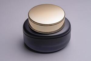 A round glass jar for cosmetics with a gold lid. Packaging for a cream or other cosmetic product. Mockup photo