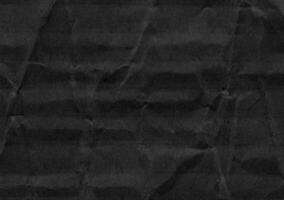 Crumpled black kraft paper texture banner background photo