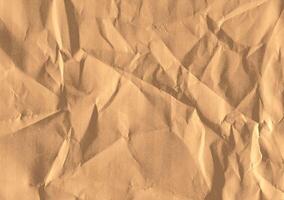 Crumpled brown kraft paper texture banner background photo