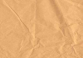 Crumpled brown kraft paper texture banner background photo