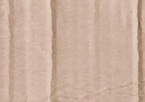 Crumpled brown kraft paper texture banner background photo