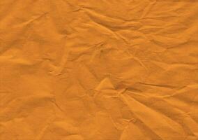 Crumpled brown kraft paper texture banner background photo