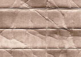 Crumpled brown kraft paper texture banner background photo