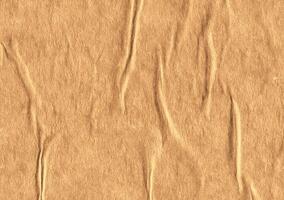 Crumpled brown kraft paper texture banner background photo