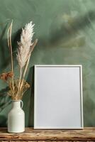 AI generated blank canvas frame template with dry flowers in vase on olive green wall mockup photo