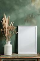 AI generated blank canvas frame template with dry flowers in vase on olive green wall mockup photo