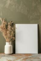 AI generated blank canvas frame template with dry flowers in vase on olive green wall mockup photo