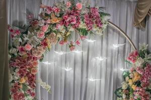 Decorating flowers and lights at a wedding photo