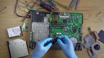 High tech. Faster Video Recording Close Up hands repair laptop. Hardware Installation Process. 4K