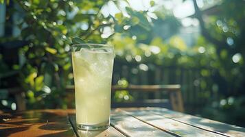 AI generated Refreshing Glass of Iced Lemonade with Lemon and Mint Captured in Medium Closeup with Focus on Condensation photo