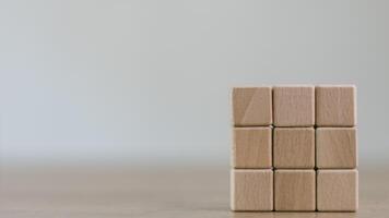 Blank wooden cubes on the table with copy space, empty wooden cubes for input wording, and an infographic icon. photo