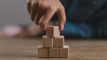 Blank wooden cubes on the table with copy space, empty wooden cubes for input wording, and an infographic icon.. photo