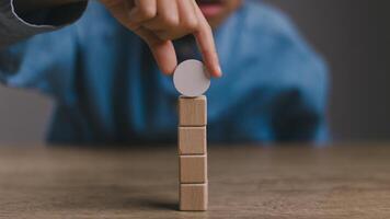 Blank wooden cubes on the table with copy space, empty wooden cubes for input wording, and an infographic icon.. photo