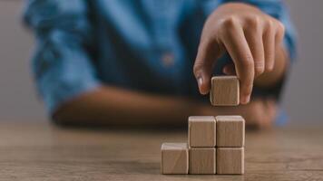 Blank wooden cubes on the table with copy space, empty wooden cubes for input wording, and an infographic icon.. photo