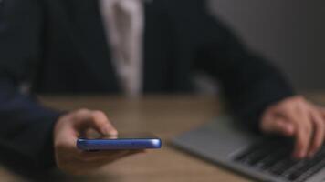 Businessmen use smartphones in offices with copy space for putting text, icons, and logo concepts for banners, wallpaper, backgrounds, and ideas. selective focus on smartphones. photo