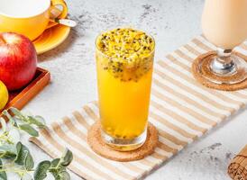 Iced Passion Fruit Green Tea isolated on mat and white background. Healthy drinks concept photo