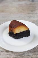 Impossible Cake slice served in a dish isolated on background top view of dessert photo