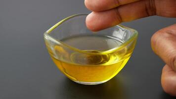 women hand using olive oil video