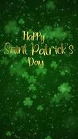 Vertical video - Saint Patrick's Day celebration greeting intro title opener animation with shiny golden metallic text and lucky green shamrocks, shiny stars and glowing glittering particles.