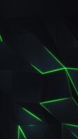 Vertical video - dark futuristic low poly background with the gentle motion of black polygonal triangle shapes and glowing green neon light. HD and looping technology motion background animation.