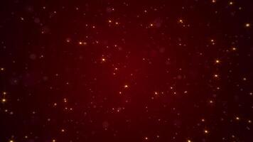 Vertical video - shiny twinkling golden stars and bokeh particles on a dark red gradient. This elegant luxury background is full HD and a seamless loop.