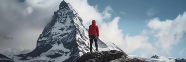 AI generated Gazing Towards the Summit, A Climber Contemplates the Majestic Mountain Peak, Setting Goals and Aspirations for the Journey Ahead photo