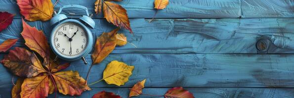 AI generated Alarm clock with color leaves on wooden table photo