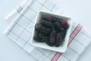 bowl of Fresh Delicious Blackberries photo