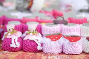 colorful Knitted shoes for an infant. photo