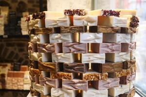 stack of natural soap bar on table photo