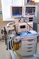 Two screens in operating room. Medical devices, interior hospital design concept. Interior of operating room in modern clinic, monitor with tests closeup photo