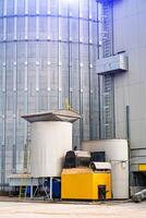 Big factory storage tanks. Industrial huge metal containers. photo