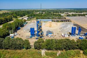 Construction site. Construction of a plant for the production of asphalt. Aerial view. photo