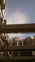 A unique perspective of a building's concrete roof, captured from below video