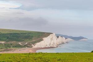 Scenic landscape photo of the cliffs at the coast of England.