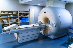 CT Scanner. Computed tomography isolated. Scan room background. Oblique view. Medical technology concept. Clipping path. photo