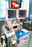 Two screens in operating room. Medical devices. Interior hospital design concept. Interior of operating room in modern clinic, monitor with tests closeup photo