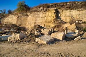 Rocks in a quarry mine. Construction material production. photo