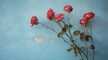 ai generado rojo rosas en contra un azul pared foto