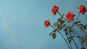 ai generado rojo rosas en contra un azul pared foto