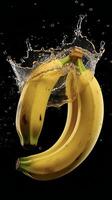 AI generated bananas are being splashed with water on a black background photo