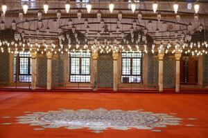 A vacant mosque featuring a circular floor pattern photo