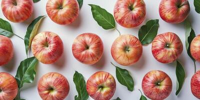 ai generado parte superior vista, plano laico Fruta modelo de manzanas con hojas foto