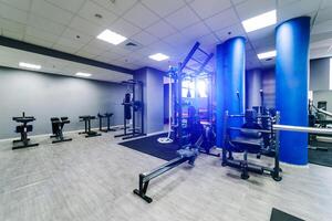 Training equipments. Workout items for healthy and martial arts. Modern equipment for doing sport exercises in the light gym. Fitness and gym workout items in sports club photo