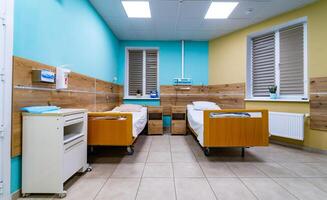 Hospital room for patients. Two beds room in modern hospital. photo