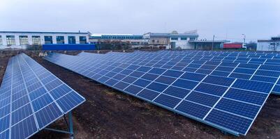 Production of solar panels. Green energy concept. Modern production factory or plant. Special equipment. photo