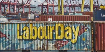 AI generated Labour Day Celebration, Text Adorned on Shipping Container, Honoring Workers Contributions photo